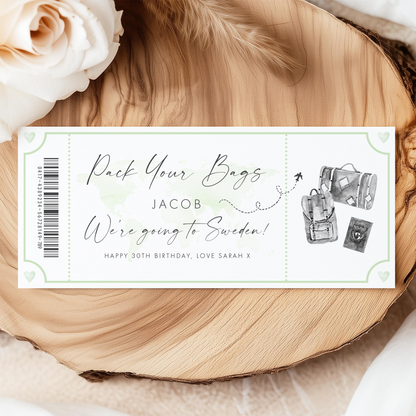 A ticket-like design with text and illustrations, including a map and luggage, suggesting it is a travel-themed design.