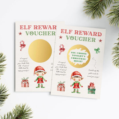 two Christmas-themed reward cards with illustrations of Santa Claus and presents, placed on a white background with pine branches in the foreground.