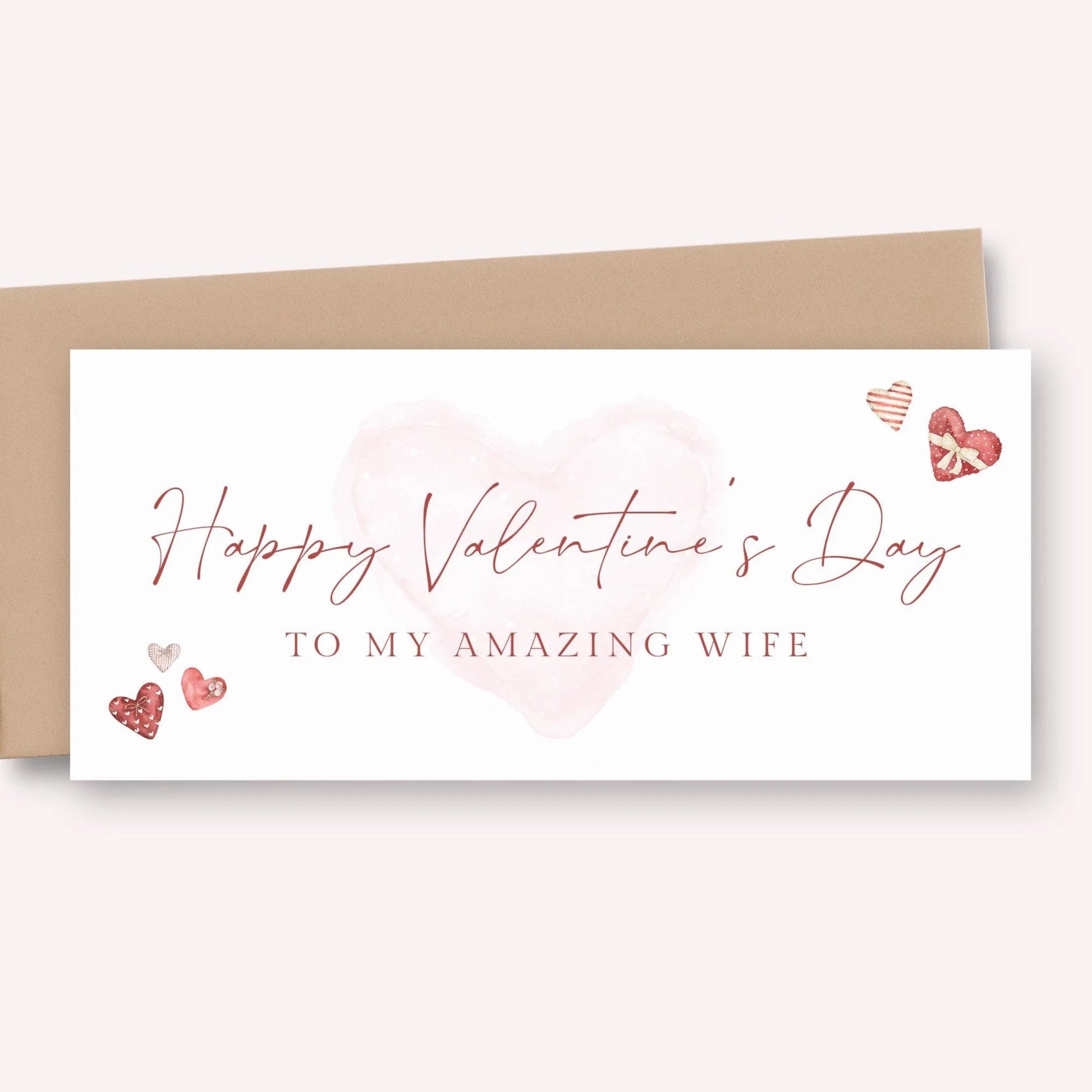 a Valentine's Day card with a pink heart and hearts as decorations. The card has a message that reads "Happy Valentine's Day to my amazing wife".