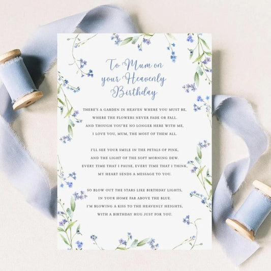 a birthday card with a floral design and a heartfelt message written in blue cursive text.