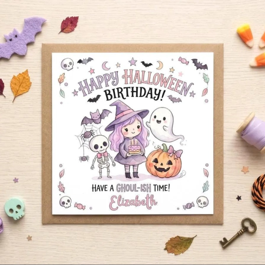 A birthday card with a Halloween theme, featuring a girl with purple hair, a skeleton, a ghost, a pumpkin, and bats. The card has a message that reads "Happy Halloween Birthday! Have a Ghoul-ish time! Elizabeth". The card is surrounded by Halloween-themed items such as candy, a key, and a skeleton.