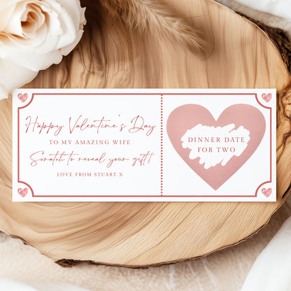 a Valentine's Day card with a heart-shaped design and a message inside.