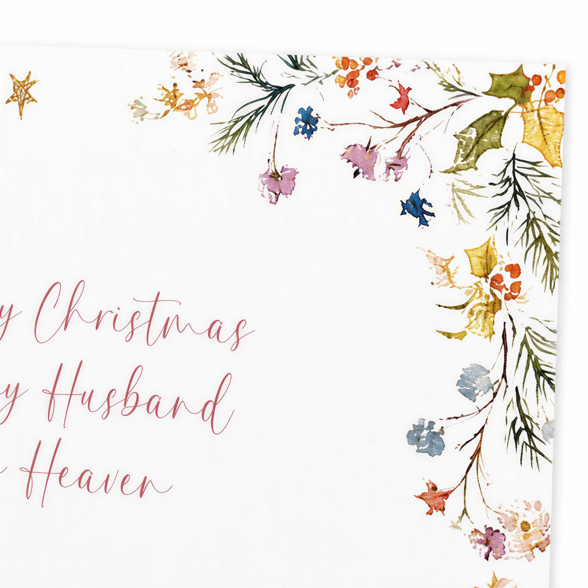 The image is a Christmas card with a floral border and a message that reads "Merry Christmas by Husband to Heaven".
