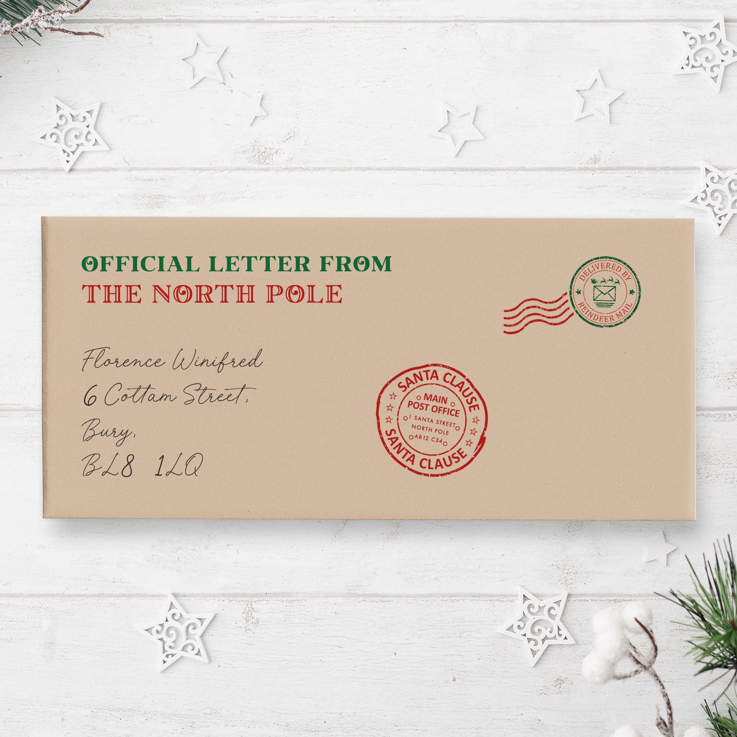 The image is an official letter from Santa Claus, addressed to Florence Winfred, with a stamp indicating it is a delivery from the North Pole.