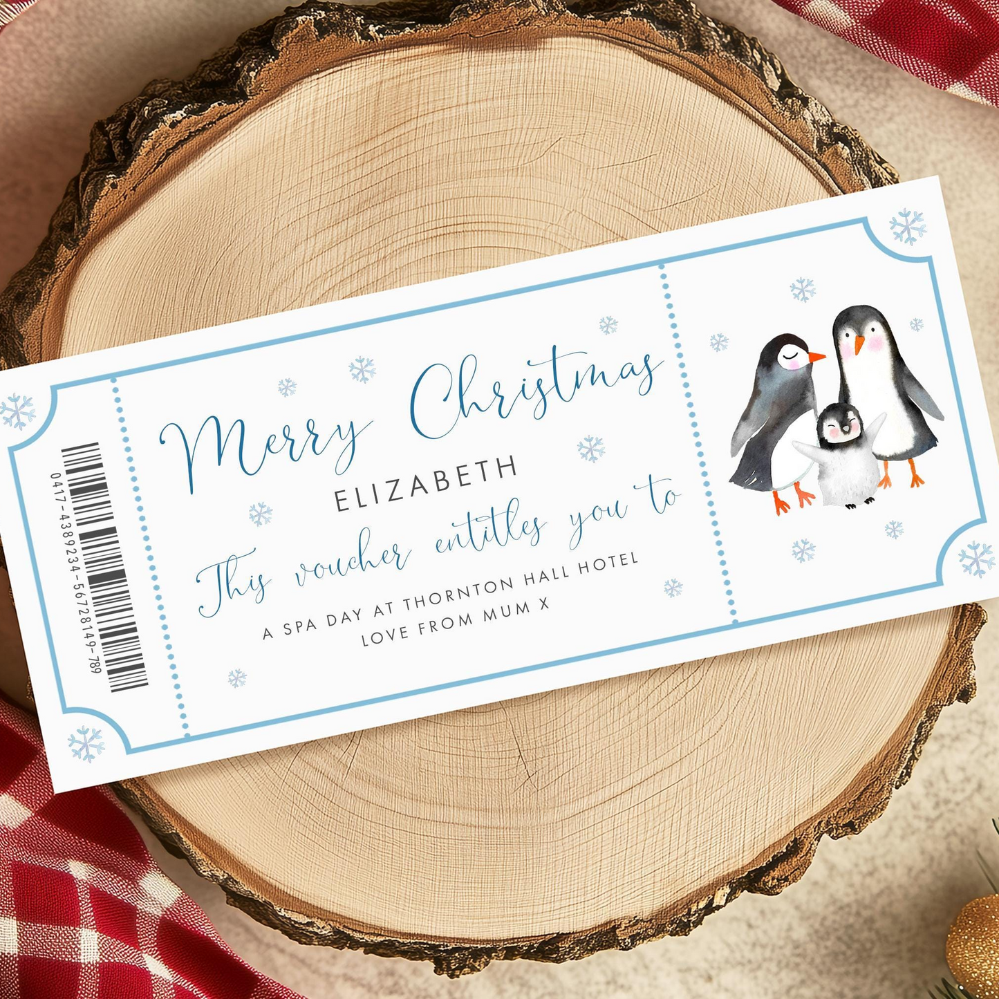 A Christmas-themed gift voucher for a spa day at Thornton Hall Hotel, with illustrations of penguins and snowflakes.