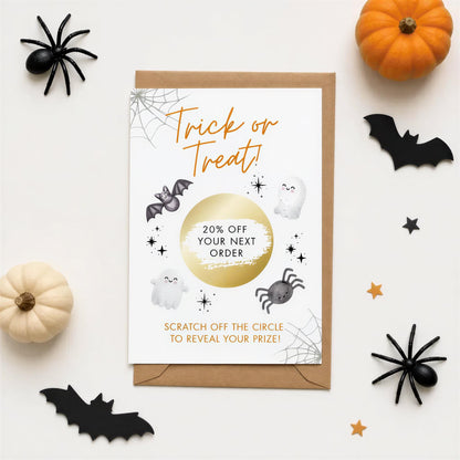 a Halloween-themed card with a 20% off offer, surrounded by Halloween decorations such as a pumpkin, spider, and bats.