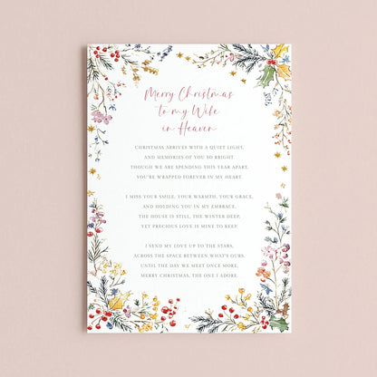 The image is a Christmas card with a floral border and a heartfelt message for a wife in heaven.