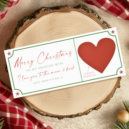 a Christmas-themed gift card with a red heart and a message expressing love and appreciation for the recipient's wife.