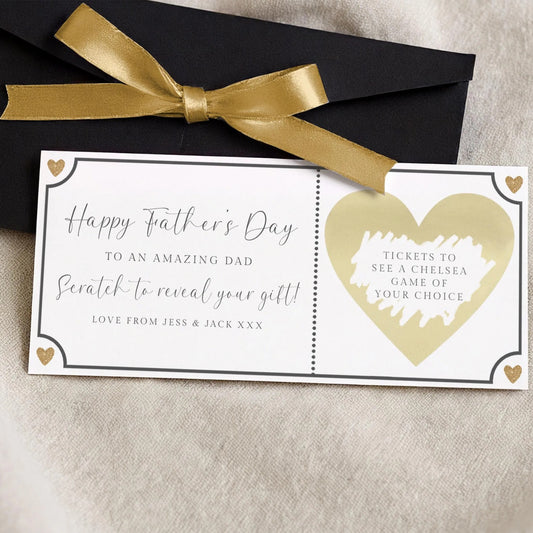 a card with a gold ribbon and a heart-shaped ticket design, along with a message for Father's Day.