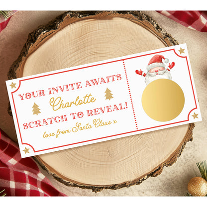 A white scratch card with a red border and a gold Santa Claus illustration, inviting the recipient to reveal their name.