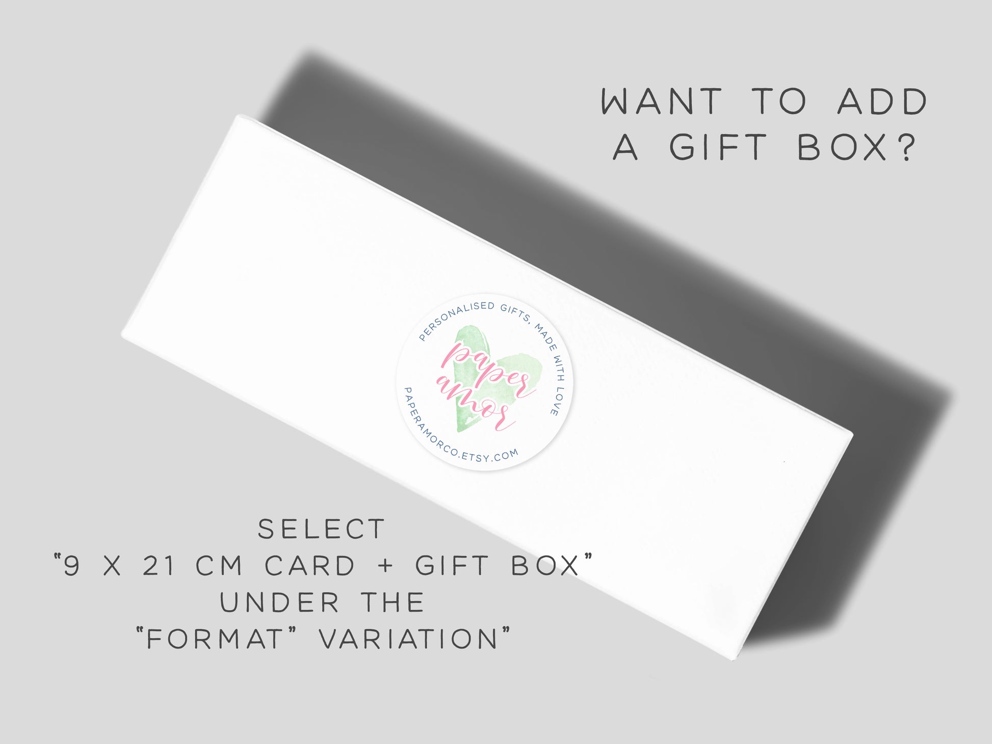The image is an advertisement for a gift box service, featuring a white rectangular box with a label that reads "Paper Love" and "Select 9 x 21 cm Card + Gift Box Under The 'Format' Variation".