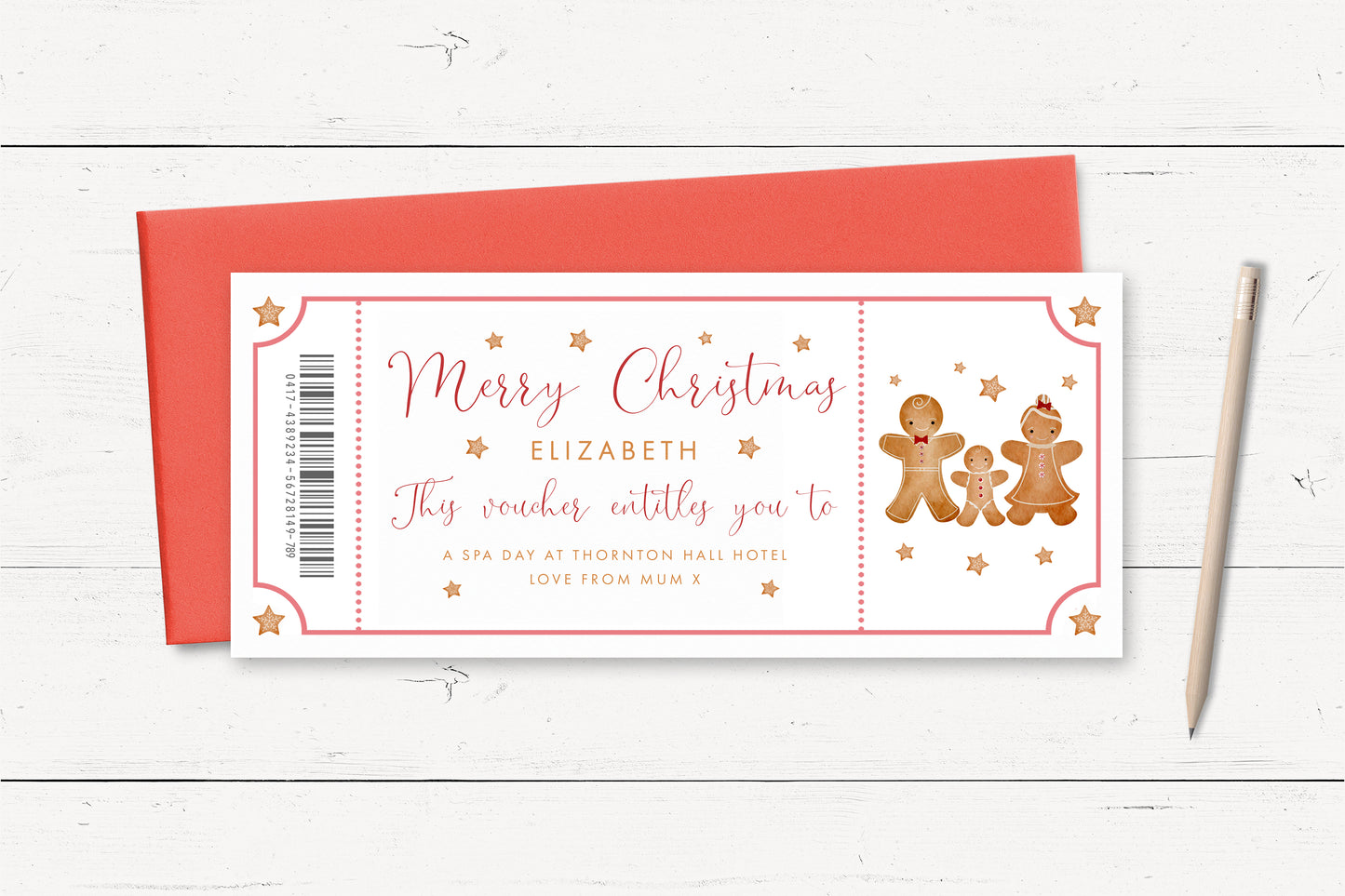 A Christmas-themed gift voucher for Elizabeth, featuring a gingerbread man and stars, placed on a wooden surface next to a pencil.