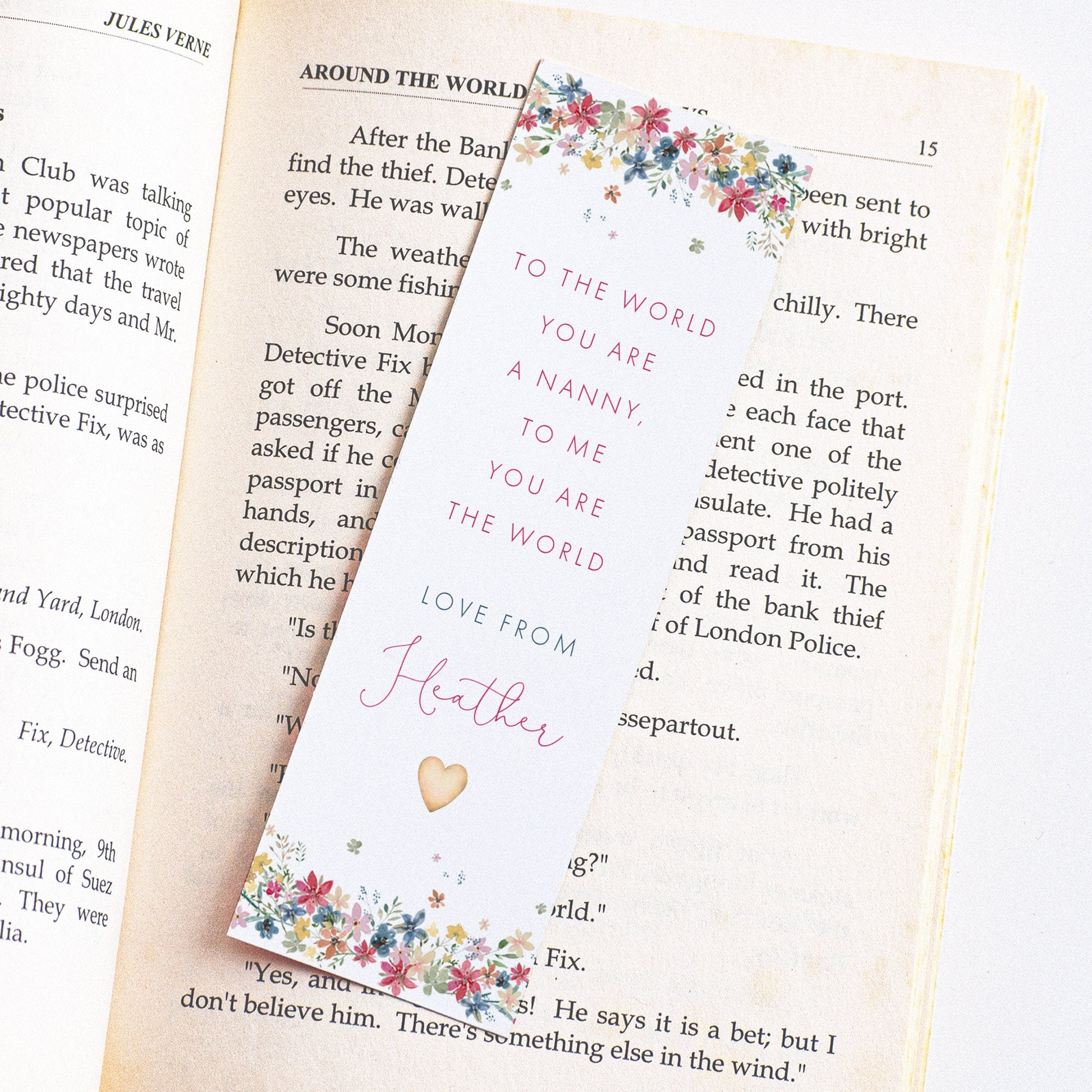 a bookmark that reads to the world you are to me you are the world