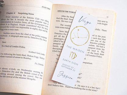 a close up of a bookmark on an open book
