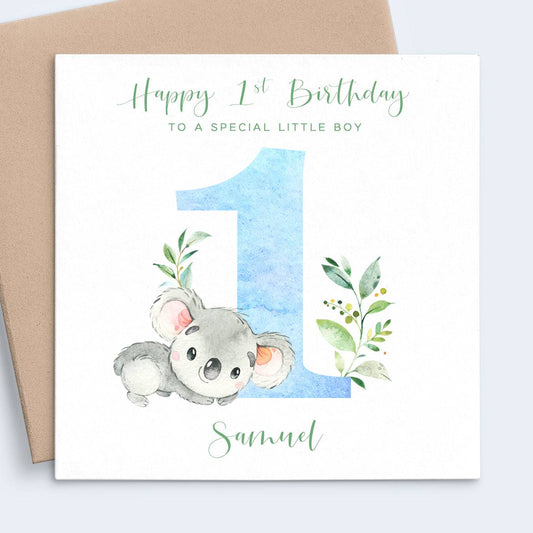 Blue watercolour koala first birthday card special boy personalised with name square white cardstock kraft brown envelope